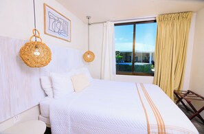 1 bedroom, desk, iron/ironing board, travel crib