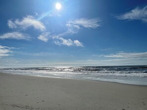 On the beach, sun loungers, beach towels