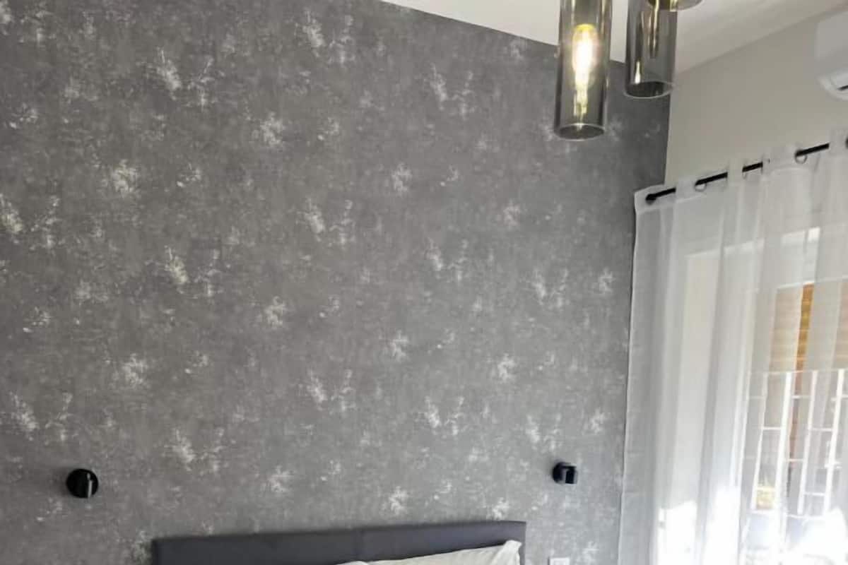 Desk, blackout curtains, soundproofing, iron/ironing board