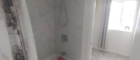 Hair dryer, towels, soap, shampoo