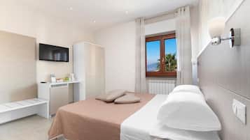 1 habitación, tabla de planchar con plancha, wifi y ropa de cama