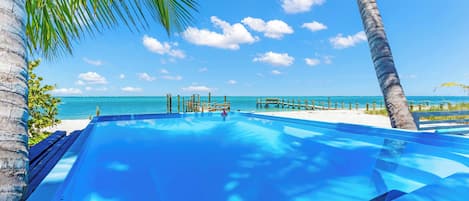 On the beach, sun-loungers, beach towels