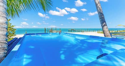 “BEACHFRONT” LUXURY ISLAND HOME. PRIVATE SWIM SPA~DOCK FISHING~GolfCart STUNNING