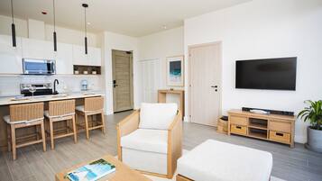 Luxury Apartment, Balcony, Ocean View | Living area | 50-inch Smart TV with cable channels