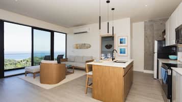 Luxury Apartment, Balcony, Ocean View | Living area | 50-inch Smart TV with cable channels