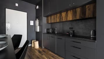 Luxury Apartment, Balcony, City View | Private kitchen | Mini-fridge, microwave, stovetop, dishwasher