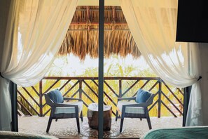 Habitación cuádruple superior, 2 camas Queen size, vista al jardín | Terraza o patio