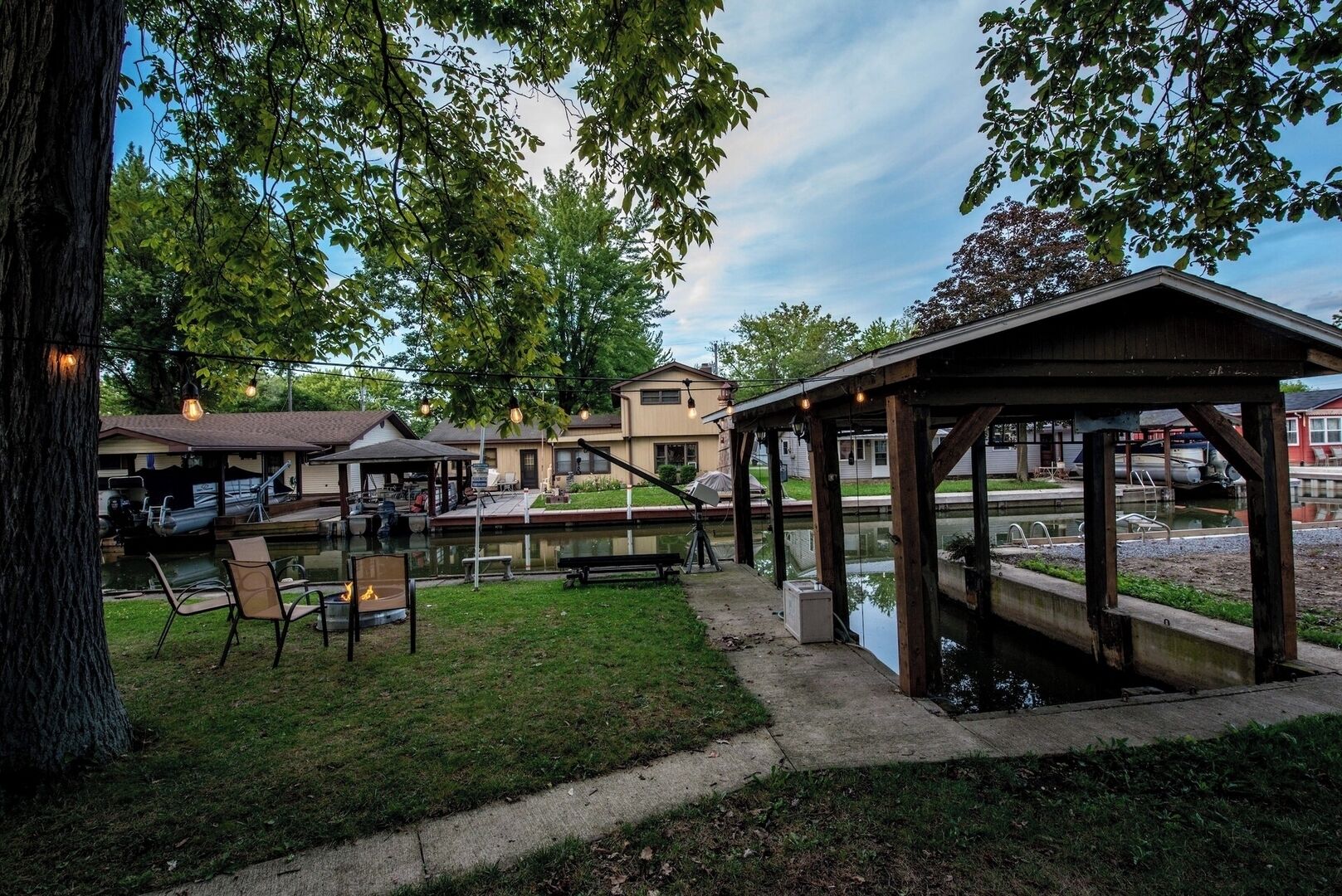 Includes Covered Boat Dock and Jet Ski Hoist.