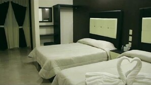 Habitación triple Confort, vista a la ciudad | Wifi gratis 