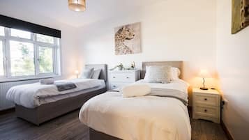 4 dormitorios, tabla de planchar con plancha, wifi gratis y ropa de cama