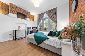 2 dormitorios, tabla de planchar con plancha, wifi y ropa de cama