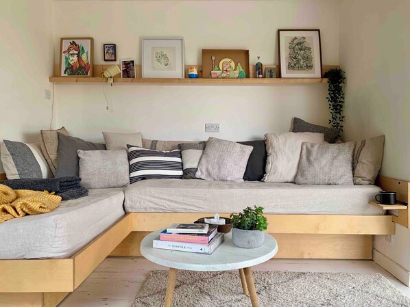 Cabaña | Área de sala de estar | Chimenea 