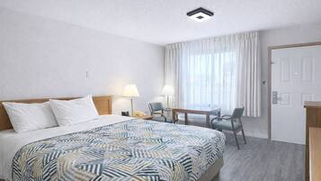Chambre, 1 très grand lit, non-fumeur | Bureau, accès au Wi-Fi (inclus), literie fournie