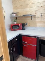 Mini-fridge, microwave, cookware/dishes/utensils