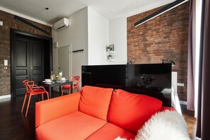 Estudio Confort, vista a la ciudad | Área de sala de estar