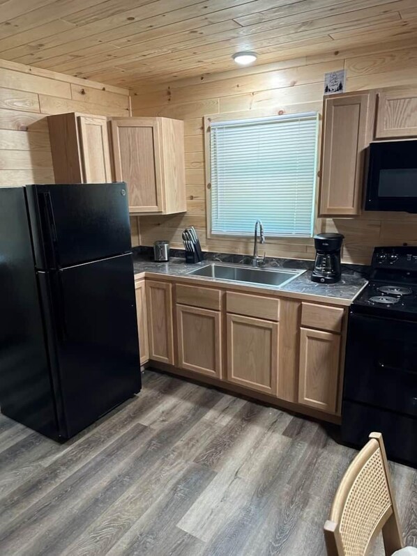 Fridge, microwave, stovetop, coffee/tea maker