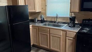 Fridge, microwave, coffee/tea maker, toaster