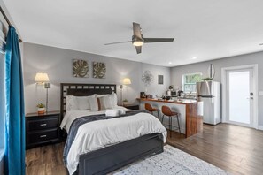 1 bedroom, desk, iron/ironing board, travel crib