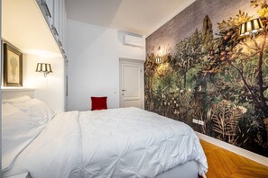 2 slaapkamers, een strijkplank/strijkijzer, reisbedje, gratis wifi