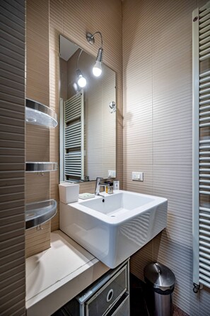 Shower, hair dryer, soap, shampoo