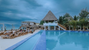 Outdoor pool, open 7:00 AM to 7:00 PM, sun loungers