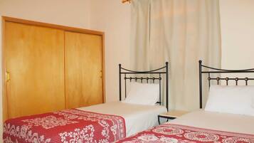 Apartment, 2 Bedrooms | Desk, laptop workspace, blackout curtains, free WiFi