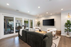 Family House | Living room | 55-inch Smart TV with digital channels, stereo