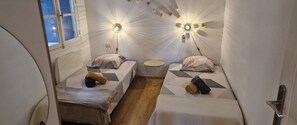 2 slaapkamers, een strijkplank/strijkijzer, gratis wifi, beddengoed