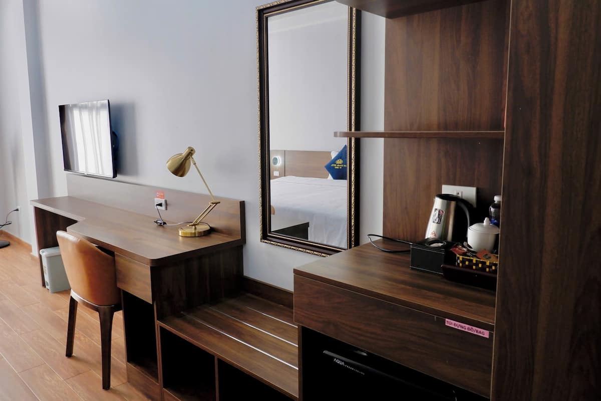 Premium bedding, memory-foam beds, free minibar, desk