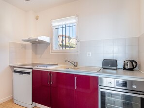 Fridge, microwave, cookware/dishes/utensils