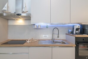 Refrigerador, horno, parrilla de estufa y lavavajillas 