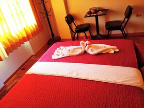 Premium bedding, down duvets, laptop workspace, iron/ironing board