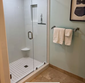 Shower, hair dryer, towels, soap