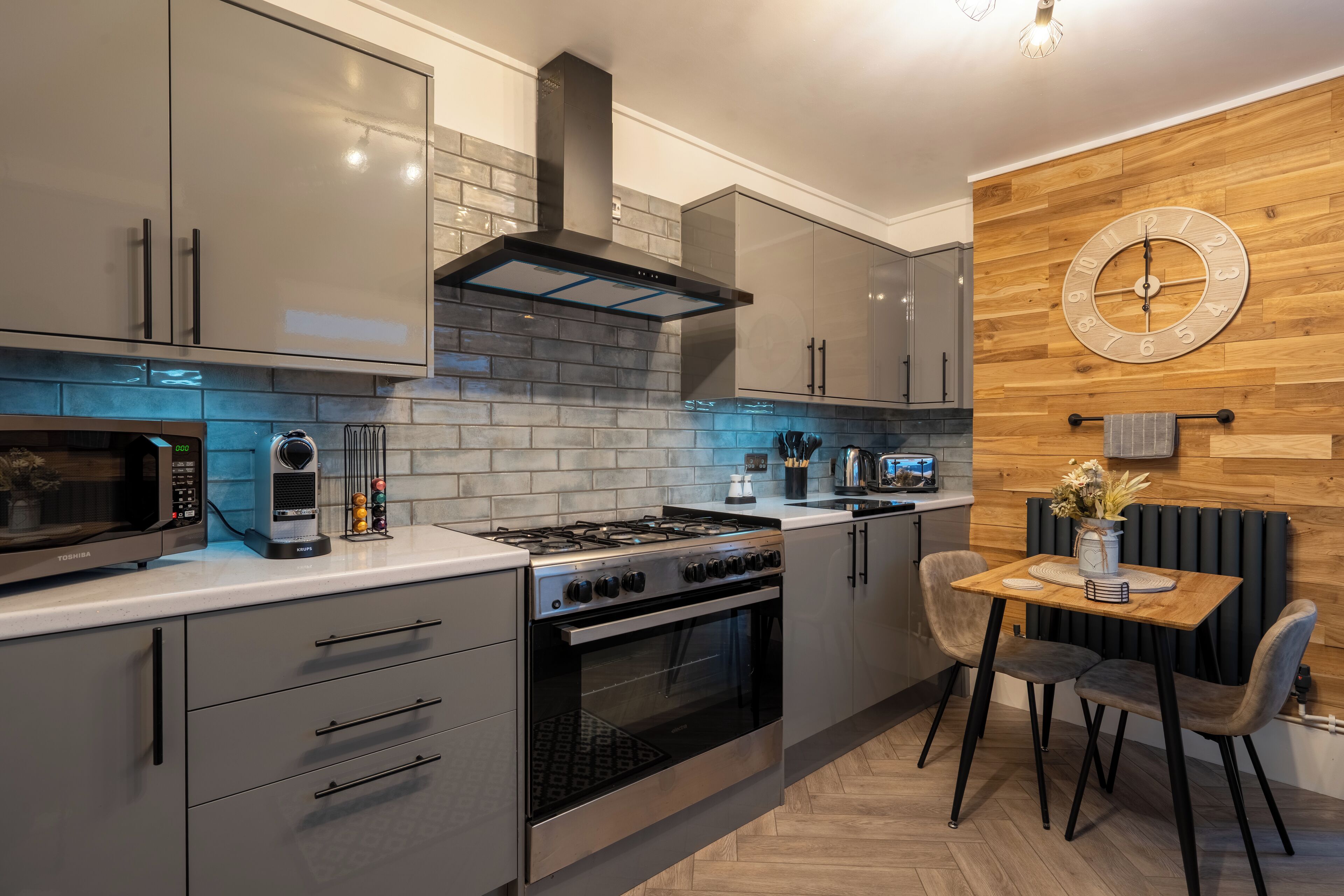 Luxury Suite | Private kitchen | Full-size fridge, microwave, stovetop, electric kettle