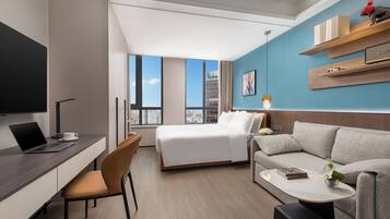 Deluxe Studio | In-room safe, desk, laptop workspace, blackout curtains