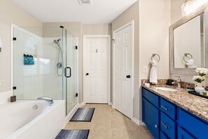 Shower, jetted tub, hair dryer, towels