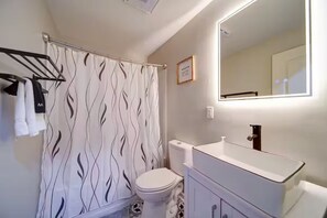Hair dryer, towels, soap, shampoo