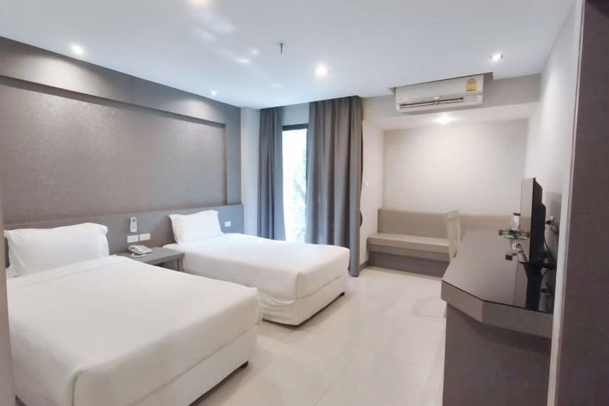 Laptop workspace, rollaway beds (surcharge), WiFi (free), bed sheets