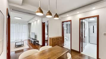 Condo, City View | Living area | 55-cm TV with digital channels