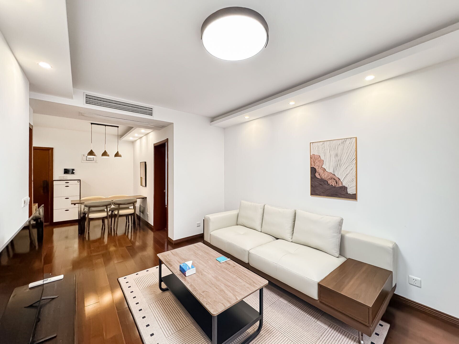 Condo, City View | Living area | 55-cm TV with digital channels