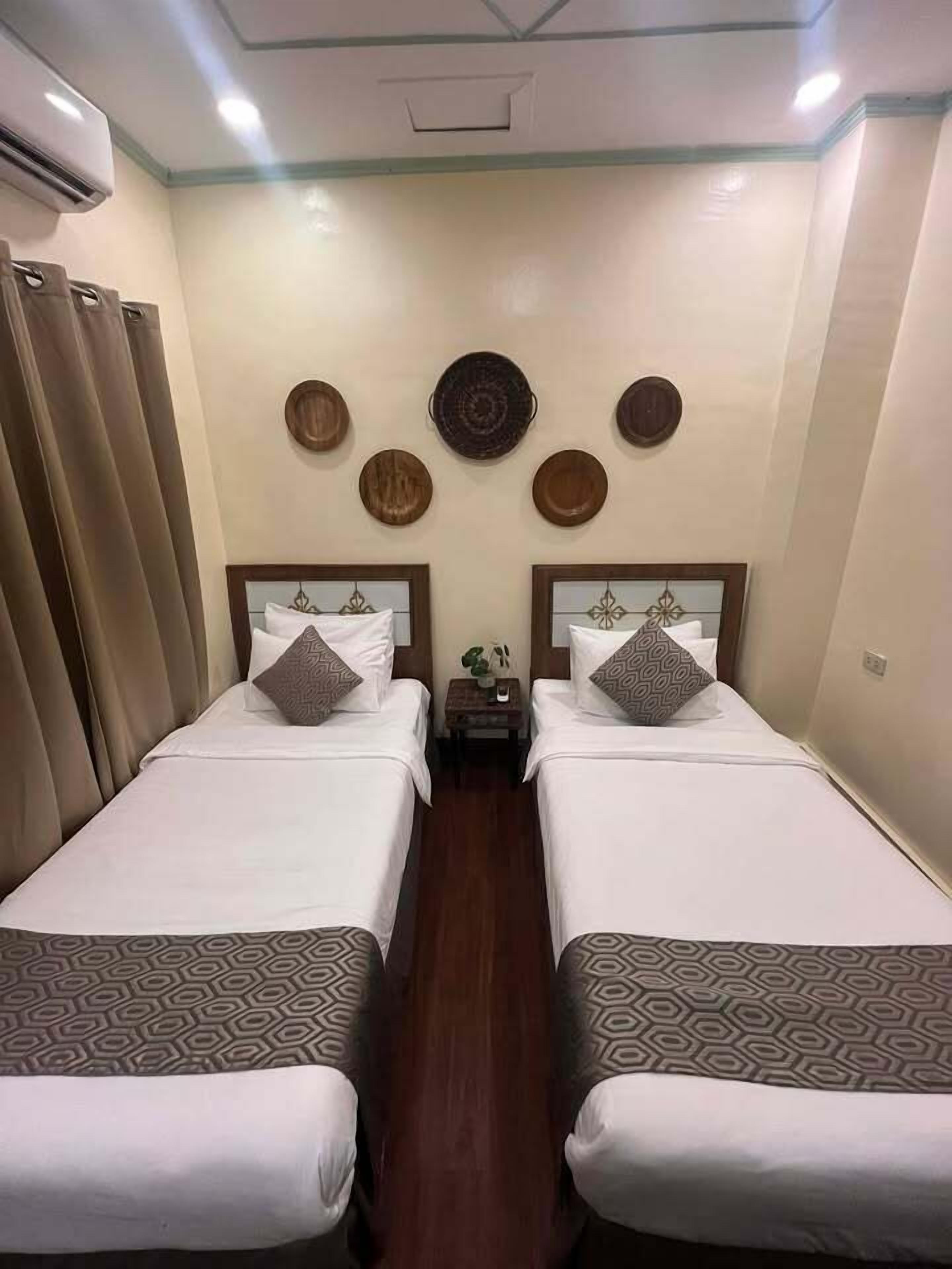 Habitación superior, 2 camas individuales | Wifi gratis y ropa de cama