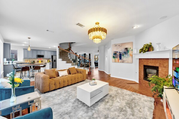 Smart TV, fireplace, foosball, books