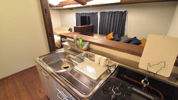 Basic Apartment, Non Smoking | Private kitchen | Full-size fridge, microwave, stovetop, cookware/dishes/utensils