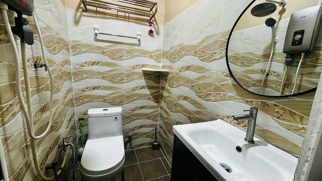 Deluxe dubbelrum - 1 kingsize-säng | Badrum | Handdukar