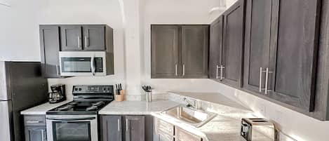 Fridge, microwave, oven, stovetop