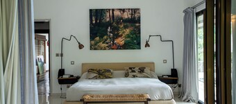Luxury Villa Peaceful, highlights the natural surroundings and tranquility.