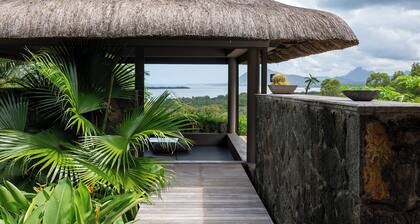 Luxury Villa Peaceful, highlights the natural surroundings and tranquility.