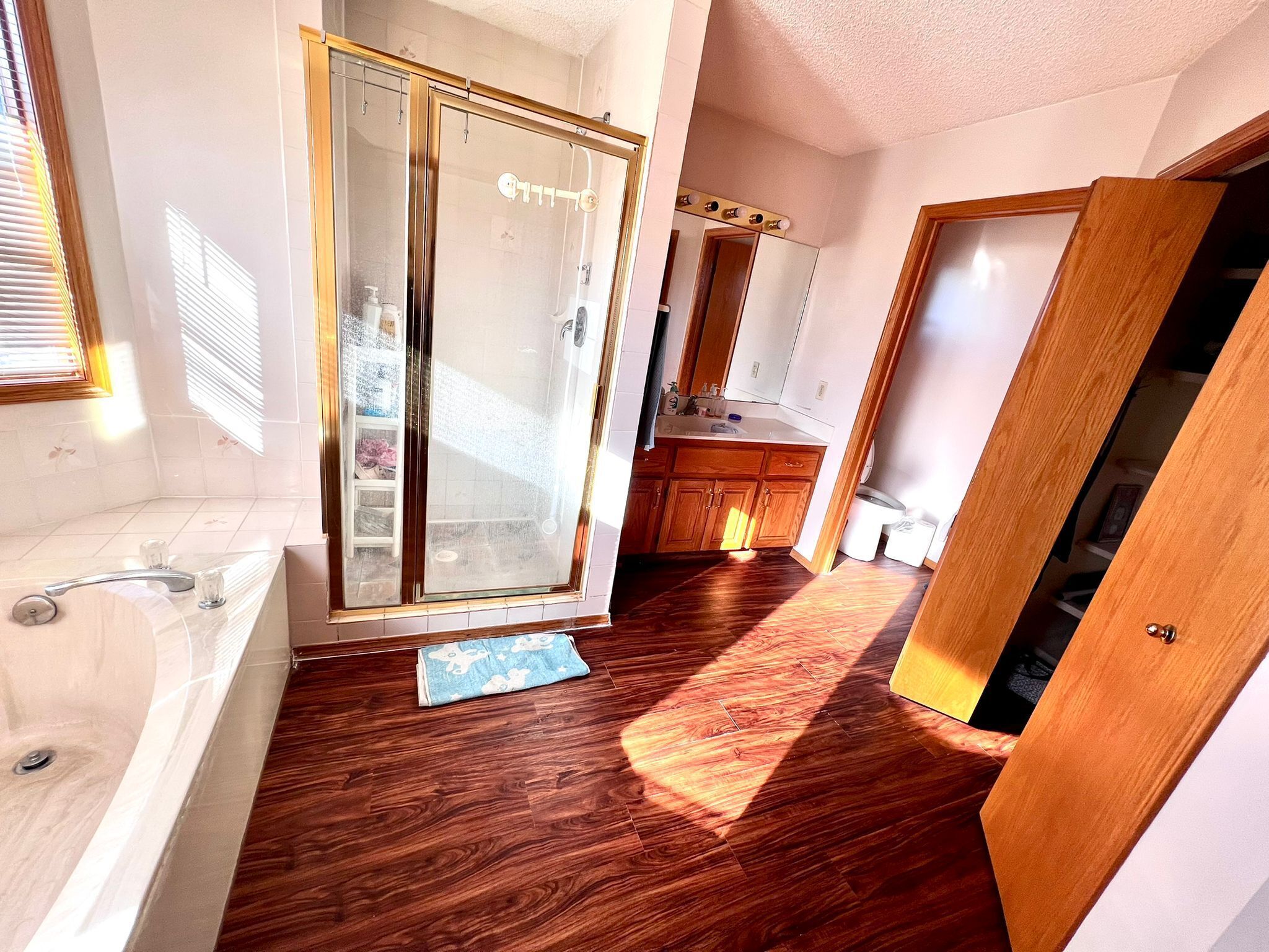 Shower, jetted tub, towels, soap