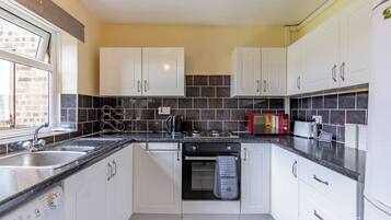 Microwave, oven, stovetop, coffee/tea maker