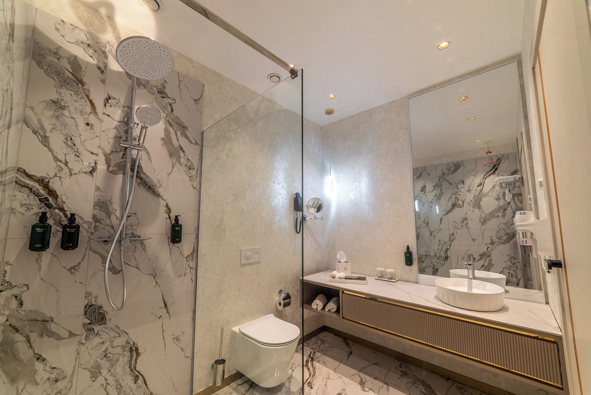 Shower, hair dryer, slippers, towels